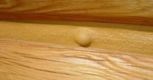 how to fix chinking and caulking blisters
